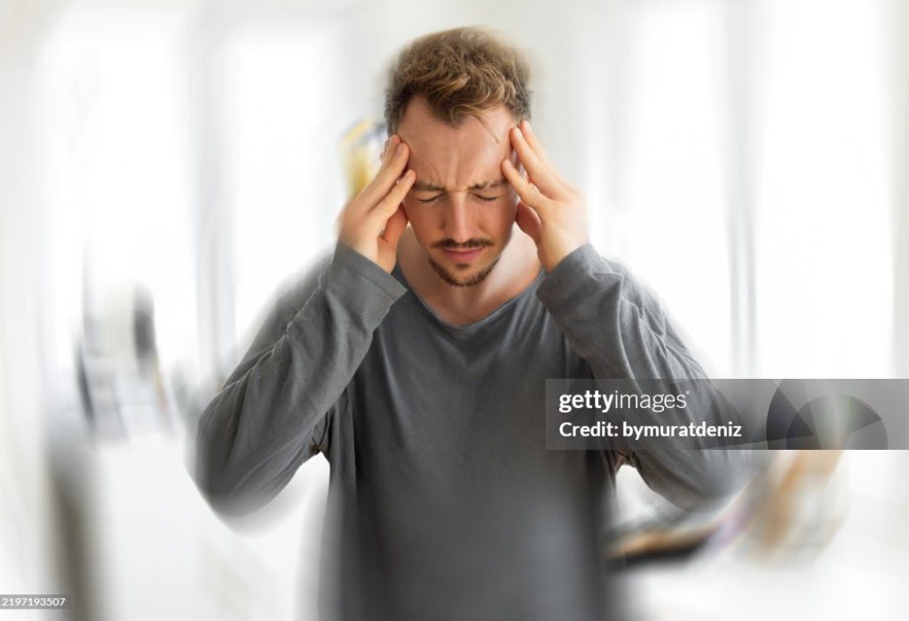Male with vertigo having strong headaches